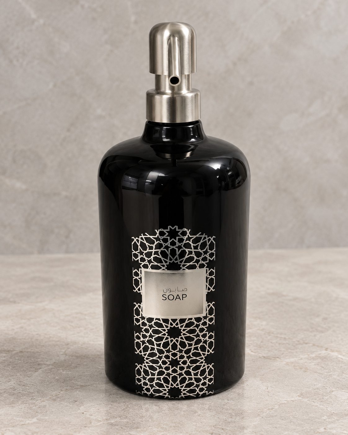 Black dispenser with geometric foil produced by Milano Group