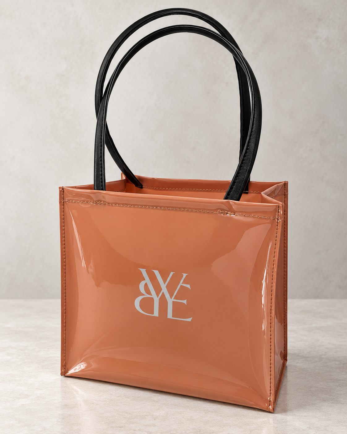 Patent leatherette gift tote produced by Milano Group